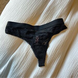 Vs pink lace thong 
Took tags off but never worn 
Brand new